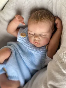 Close-up of lifelike reborn baby doll skin with realistic hand-painted texture