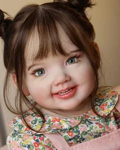 Close-up of Cammi reborn toddler doll showing realistic facial details and blue eyes