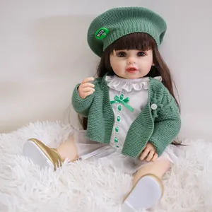 Poupée Reborn Réaliste en Silicone Vinyle Corps Complet Lavable Jouet Nouveau-Né avec Tenue en Tricot Vert et Cheveux Bruns pour Cadeau Enfants