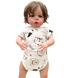 Lifelike 60cm reborn baby doll Sandie in white cartoon printed onesie on white background