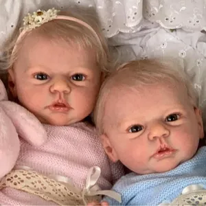 Close-up of 19-inch lifelike reborn dolls with visible veins and realistic skin textures