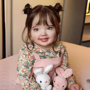 Realistic 70cm reborn toddler doll with flower shirt, pink overalls and bunny toys