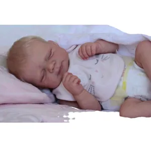50cm lifelike reborn sleeping baby doll in pink bib and diaper with plush blanket
