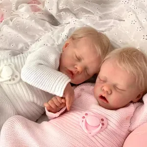 Realistic 48cm reborn baby doll twins in knitted white and pink sleeping outfits