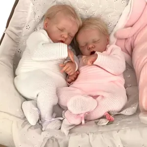 Twin A and B 48cm lifelike reborn baby dolls sleeping in a white lace nursery basket