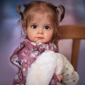 Realistic 3D painted Maggi toddler reborn doll in purple floral hoodie with plush toy