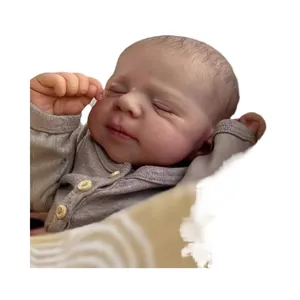 Realistic 19 inch reborn baby doll in grey knitted sweater sleeping peacefully
