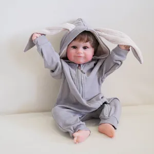 50cm realistic reborn baby doll Maddie wearing grey rabbit ear hoodie on beige background
