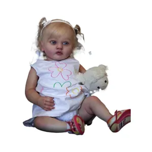 Lifelike 60cm reborn baby doll with blonde pigtails, floral dress and plush lamb toy