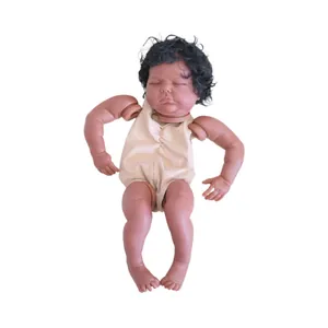 20-inch dark-skinned reborn baby doll with curly black hair in a sleeping pose