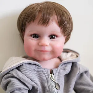 50cm lifelike reborn baby doll Maddie with rooted brown hair and grey hooded sweater