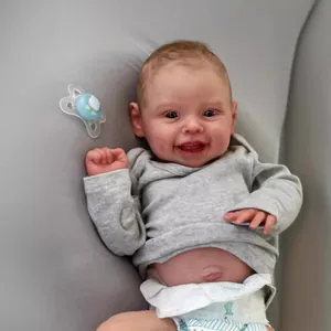 50cm lifelike Reborn Baby Doll Harper with realistic smiling expression and grey outfit