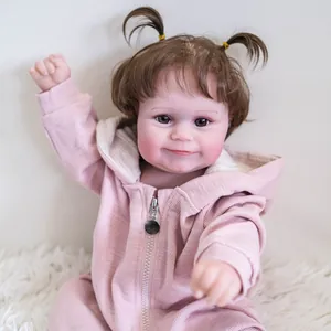 50cm lifelike reborn baby doll Maddie with rooted hair in a pink hooded jumpsuit
