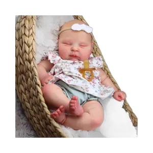 Lifelike 49cm reborn baby doll Peaches with 3D hand-painted skin in a cozy cradle