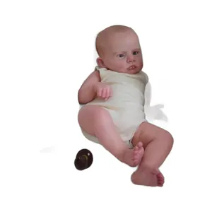60cm realistic reborn baby doll Cameron in white onesie with brown pacifier on white background