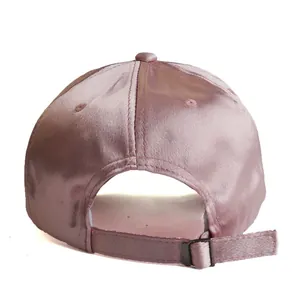 Pink satin baseball cap featuring a premium glossy finish and adjustable metal back buckle