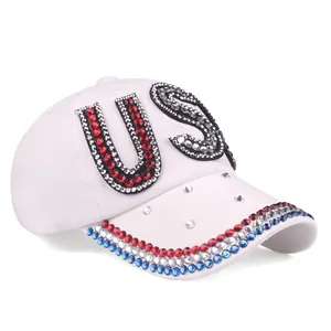 White baseball cap with rhinestone USA letters and tri-color crystal brim design