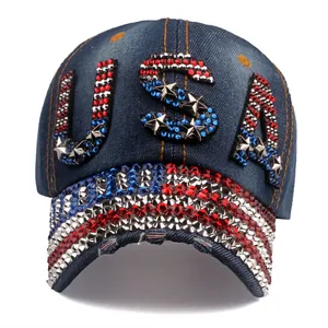 Blue denim baseball cap with USA rhinestone lettering and star-spangled brim detail