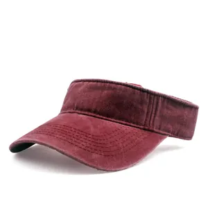 Detailed close-up of burgundy washed cotton sun visor hat with reinforced stitching