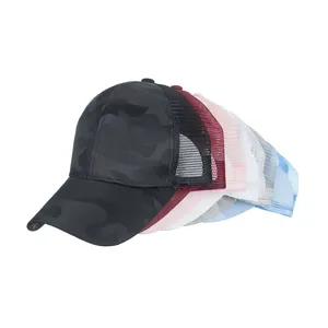 Detailed grid of camouflage ponytail baseball caps in various colors with mesh back design
