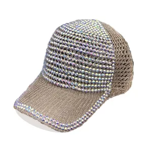 Detail of luxury mesh baseball hat with iridescent rhinestones and champagne gold weaving