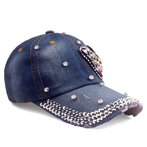 Denim baseball cap with rhinestones and a large colorful butterfly patch