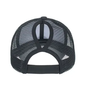 Black mesh ponytail trucker hat with breathable fabric and adjustable velcro back strap