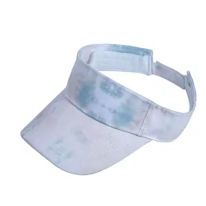 Detail of colorful tie-dye sun visor with adjustable velcro strap and reinforced stitching