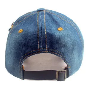 Back view of blue denim baseball cap with yellow stitching and leather strap