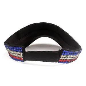 Black sun visor hat with American flag rhinestone embellishments and adjustable strap