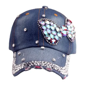 Denim baseball cap with colorful rhinestone butterfly and distressed brim detail