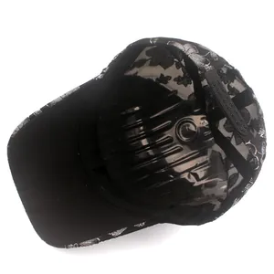 Detail of black lace baseball cap interior showing floral pattern and adjustable plastic strap