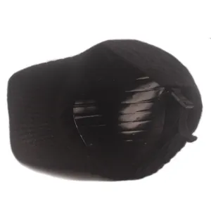 Detail of black knitted baseball cap interior with adjustable strap and ribbed texture