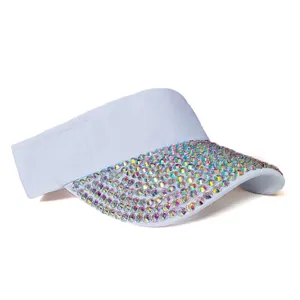 Detail of white sun visor hat with colorful rhinestones on the brim for summer sun protection
