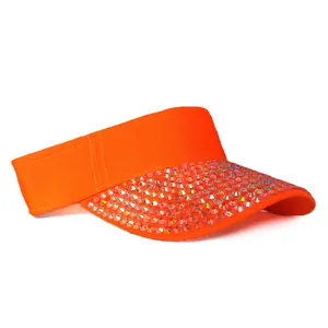 Close-up of bright orange sun visor with colorful rhinestones and premium stitching
