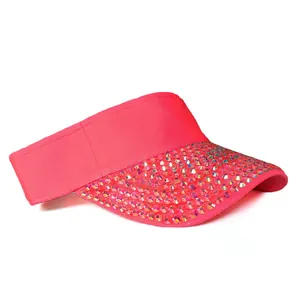 Close-up of pink open top sun hat with colorful rhinestones on the brim and textured fabric