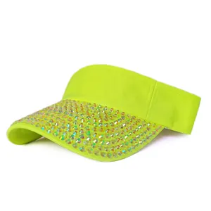 Detail view of fluorescent yellow sun visor with colorful rhinestones on the brim