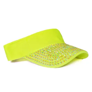 Detail view of fluorescent green sun visor with colorful rhinestones on the brim