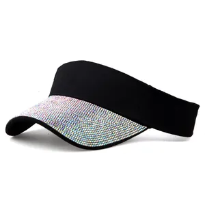 Detail shot of black sun visor hat with colorful iridescent rhinestones on the brim