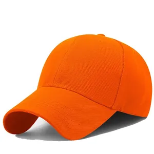 Detail of the bright orange cotton baseball cap with classic curved brim and six panels
