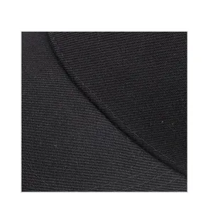 Macro shot of black twill fabric texture and neat stitching on summer sun visor cap