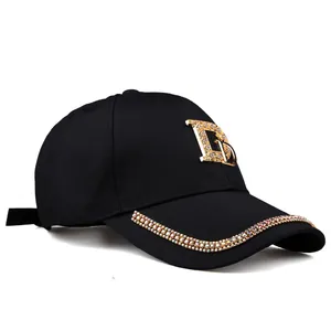 Casquette de baseball noire pour femmes avec logo DG doré et bordure en strass