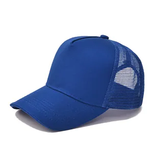 Detail of navy blue trucker hat featuring breathable mesh back and solid cotton front panel