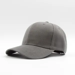 Detail view of the six-panel crown and ventilation eyelets on the grey baseball cap