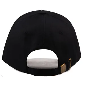 Adjustable back view of a black American flag baseball cap with bronze metal buckle
