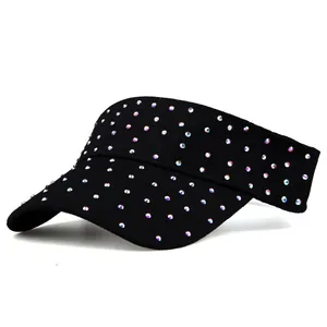 Detailed view of colorful rhinestones on a black cotton open top sun visor hat