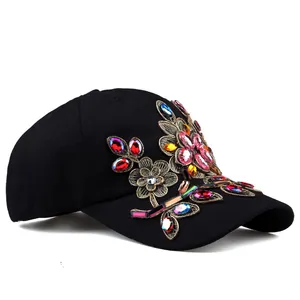 Black cotton baseball cap with colorful rhinestone flowers and gold embroidery details