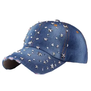 Deep blue denim baseball cap with silver star studs and distressed brim details
