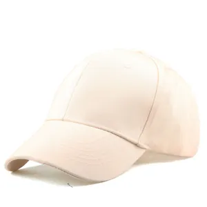 Detailed side view of a solid beige cotton twill baseball cap with breathable eyelets