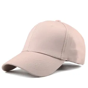 Close-up of pink cotton baseball cap featuring reinforced stitching and breathable eyelets